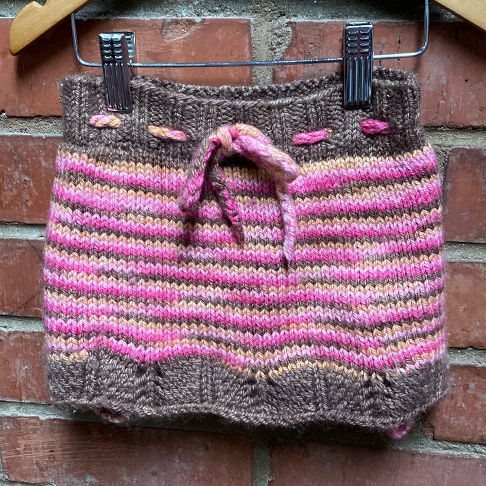 Hand knitted baby a-line skirt with shorties